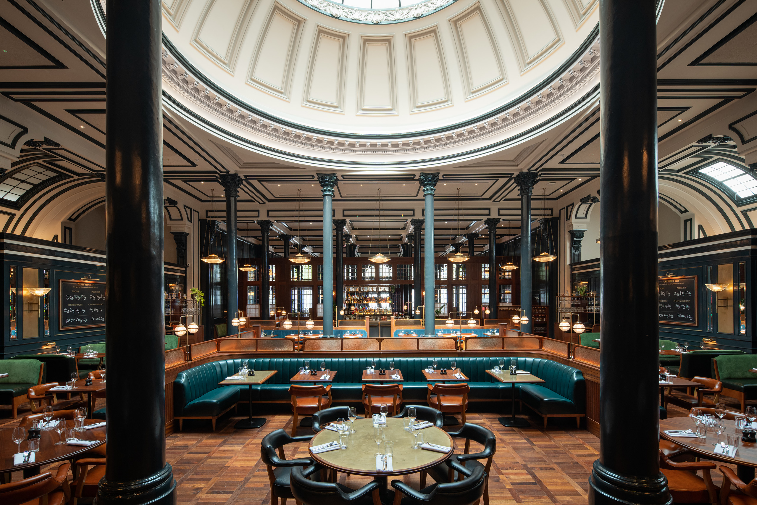 A wide shot of a main dining room at hawksmoor Dublin
