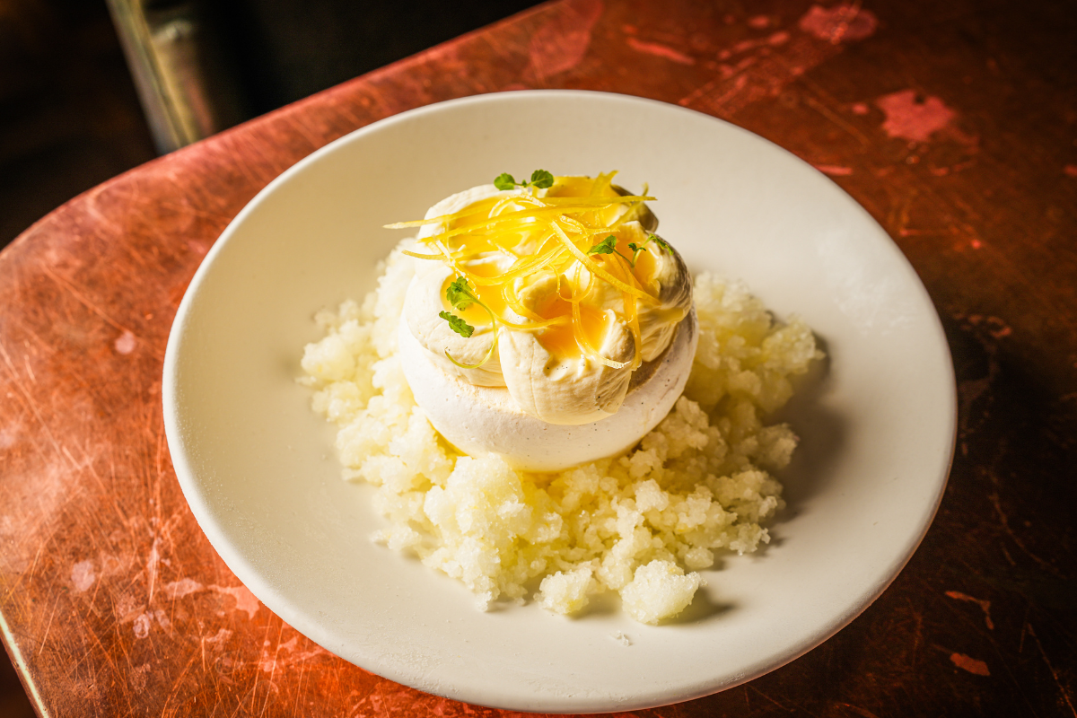 Home 3 A shot of pineapple pavlova on a white plate